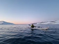 Gary paddling at dusk in the Arctic