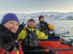 The Arctic expedition team together on the water