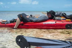Resting in the kayak in shallow water