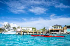 Paddling past the colourful waterfront